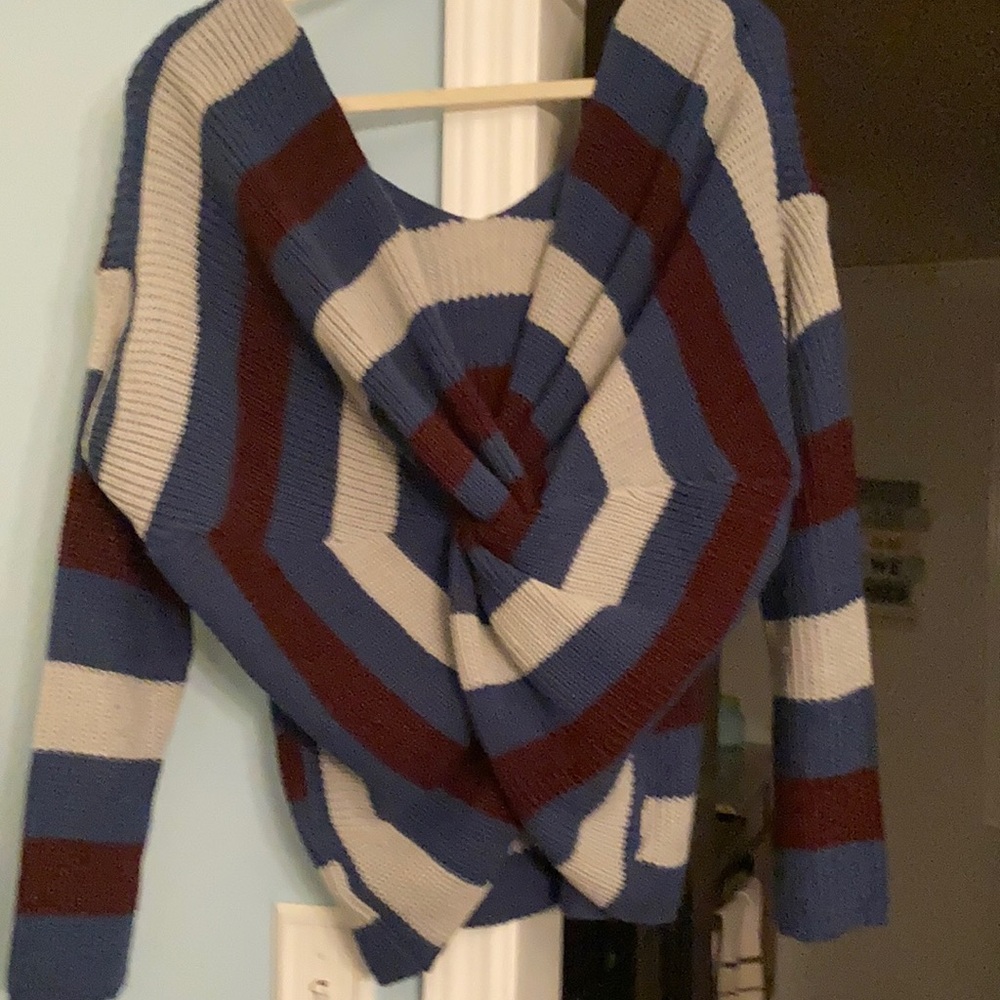Like new sweater! First picture is actually the back! Very cute!!